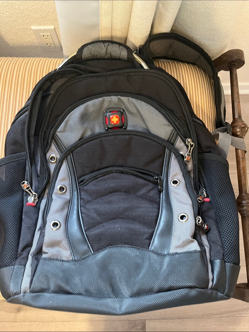SwissGear Black and Gray Travel Laptop Backpack with Red Logo Accent